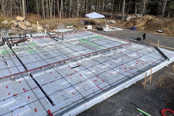 Near Zero-Passive Structural Slab Foundations